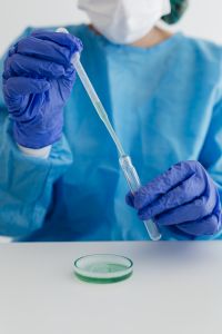 Kaboompics - Female Scientist Using Pipette for Sample Analysis
