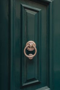 Kaboompics - Dark Green Door with Polished Metal Ring Knocker