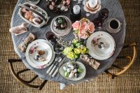 Kaboompics - Round dinner table decorated with easter motifs