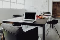 Kaboompics - Black Office Chair and Open MacBook at a Designer's Worktable