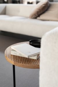 Kaboompics - Close-Up of Books and Black Mug on an Oak Side Table