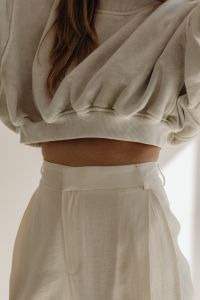Kaboompics - Minimalist White Sweatshirt with Wide-Leg Trousers