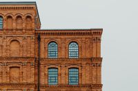 Kaboompics - Arched Industrial Windows across the Historic Manufaktura Brick Factory in Łódź