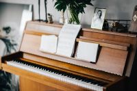 Kaboompics - Old piano with sheet music