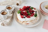 Kaboompics - Overhead Berry Pavlova Cake with Two Espresso Cups and Neutral Tableware