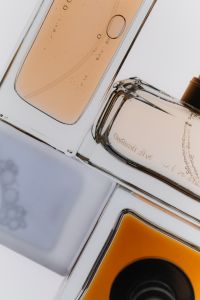 Kaboompics - Luxury Fragrance Bottle Background Pattern