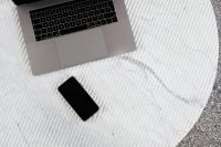 Kaboompics - Laptop and Smartphone on White Fluted Marble, Minimalist Desk Flat Lay