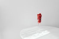 Kaboompics - Minimal Raspberry Filled Champagne Flute