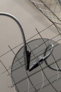 Kaboompics - Modern Wire Grid and Metal Disc Abstract Background