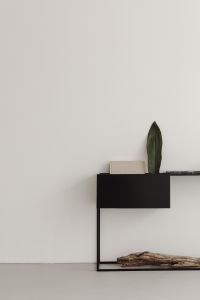 Kaboompics - Cloud Dancer White Console Table with Plant and Decor