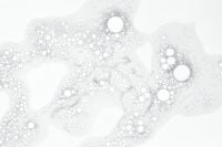Kaboompics - White Cosmetic Liquid Foam with Large Bubbles, Textured Macro Background
