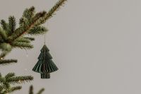 Kaboompics - Green Paper Christmas Tree Ornament on a Branch