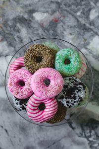 Kaboompics - Assorted Donuts In Glass Bowl On Marble