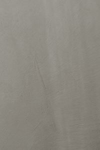 Kaboompics - Soft-Focus Gray Microcement Background with Vertical Wavy Streaks