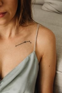 Kaboompics - Constellation Tattoo on a Woman’s Shoulder in a Satin Top