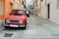 Kaboompics - An old red Renault 4 car parked on the street in Izola, Slovenia