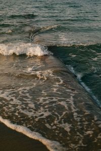 Kaboompics - Concrete Pipe Wave Foam Sandy Beach Close-Up