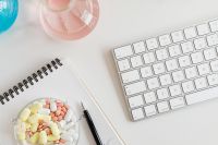 Kaboompics - Laboratory Notes and Keyboard With Colorful Glassware