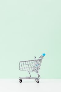 Kaboompics - Minimal Shopping Trolley on Mint Green Background with Copy Space