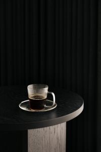 Kaboompics - Glass Coffee Cup on Black Round Table