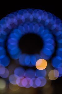Kaboompics - Dark Navy Ferris Wheel Bokeh with an Amber Orb Near the Edge
