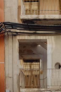 Kaboompics - Weathered Doorway and Wires on a Malta Facade