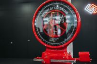 Kaboompics - Vintage Red Weighing Scale with “Weight of the Dream” Dial, Design Exhibition Installation