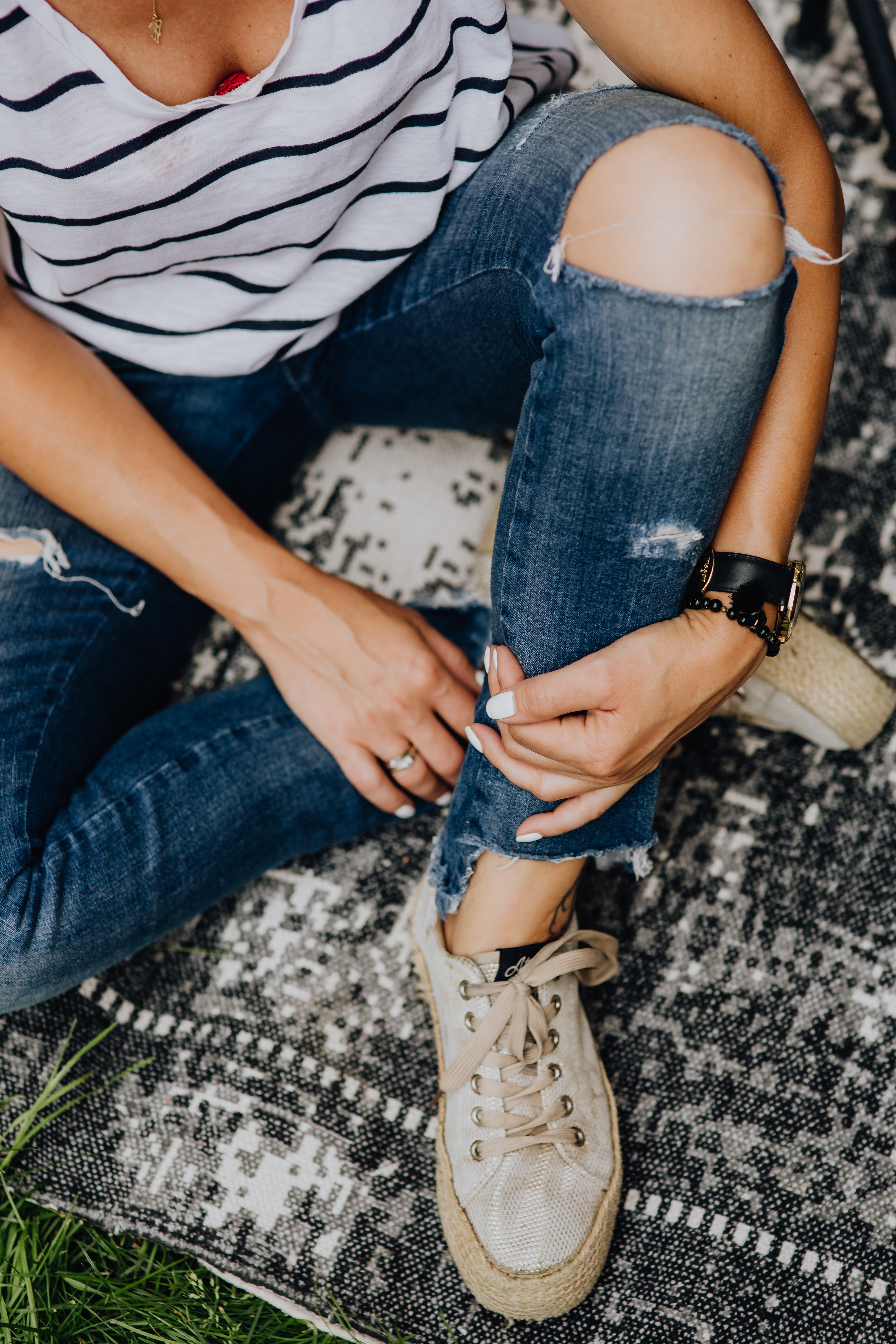 Close up fashion details - stylish young woman