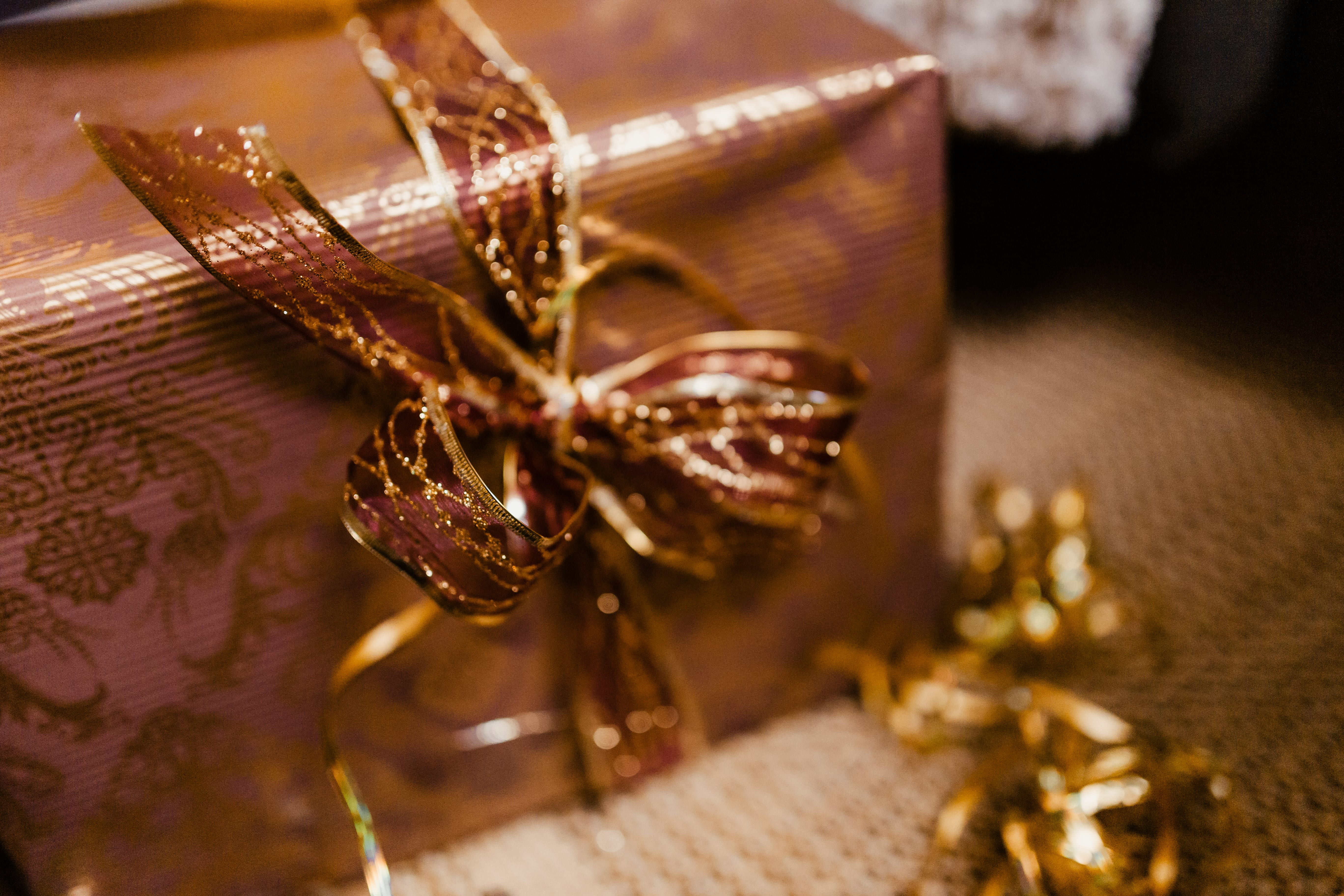 New Year's Eve party - closeup of gift with ribbon