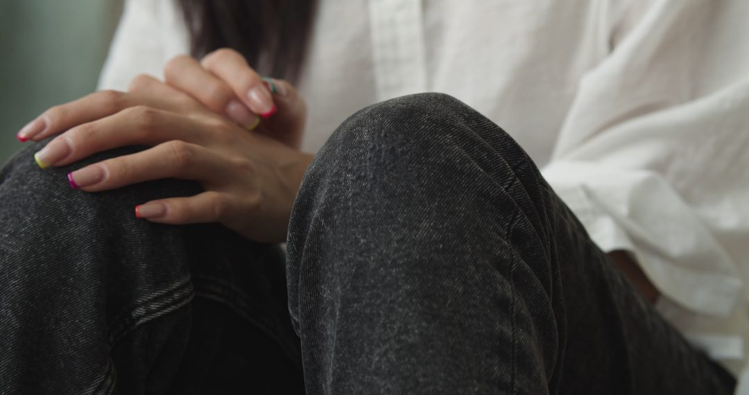 A Close-up on Woman's Hands with Nail Polish