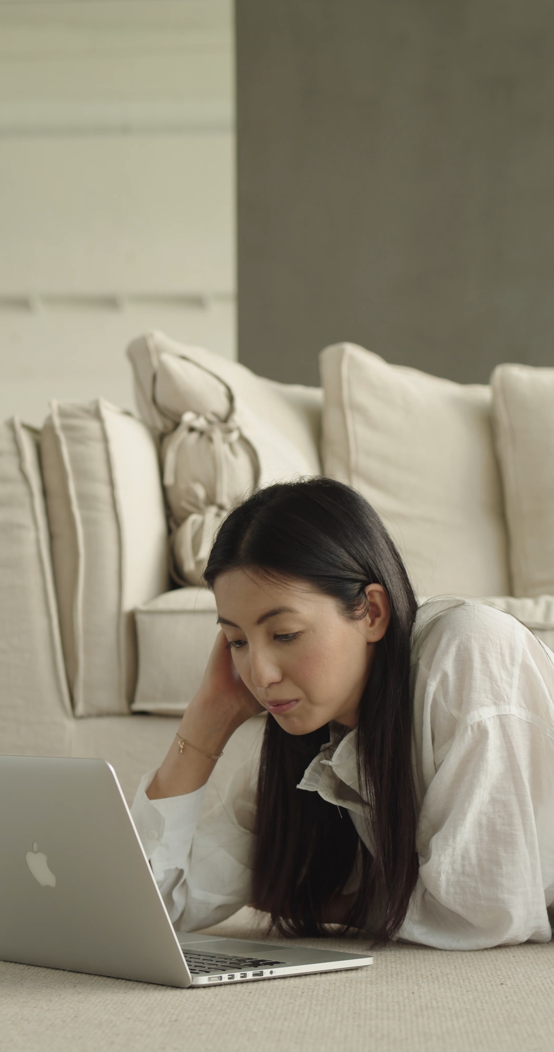 Woman Having a Zoom Meeting on MacBook